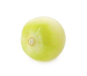Photo of One unripe cherry tomato isolated on white