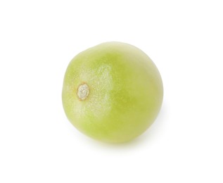 Photo of One unripe cherry tomato isolated on white