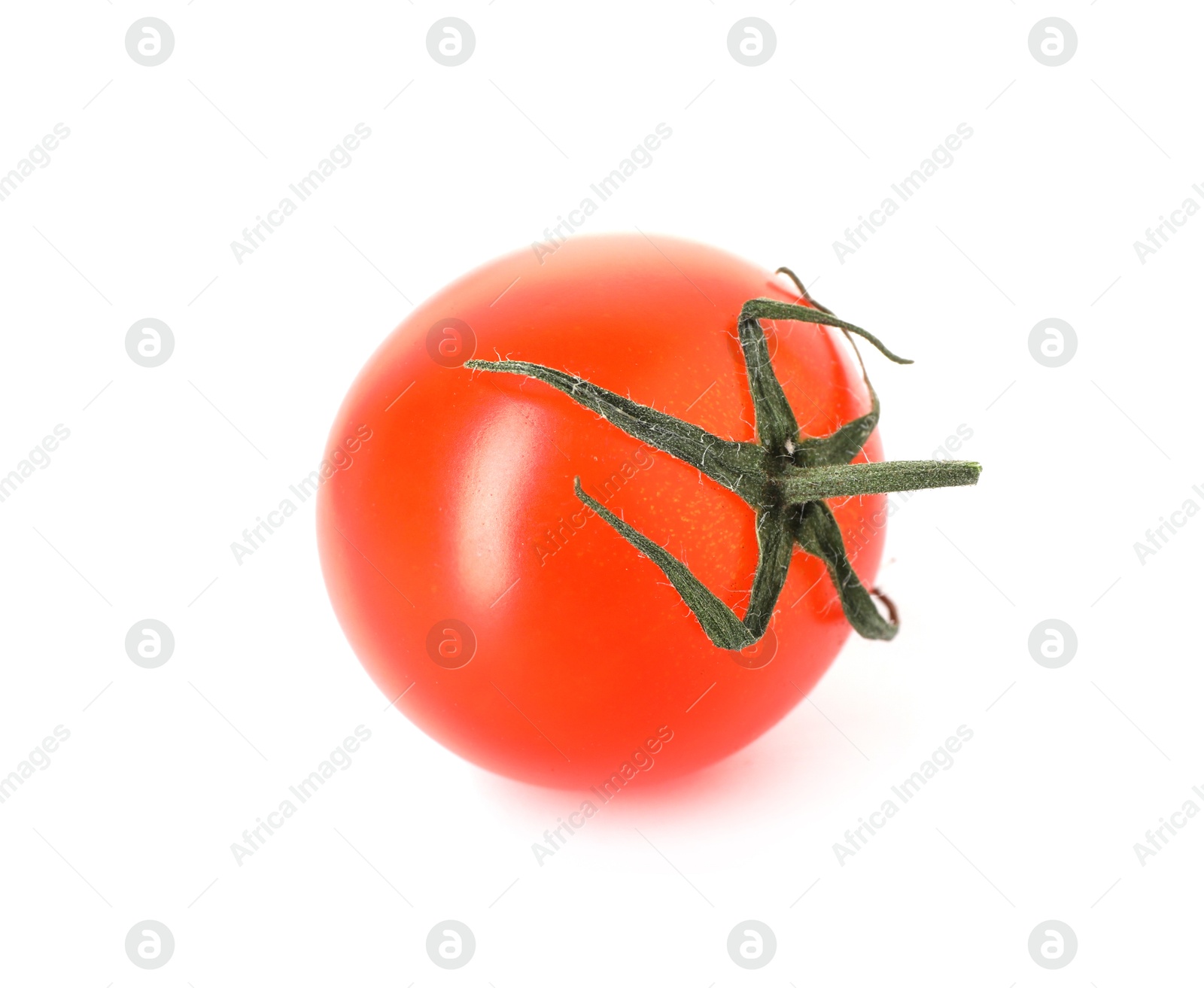 One ripe cherry tomato isolated on white Photo of One ripe cherry tomato isolated on white