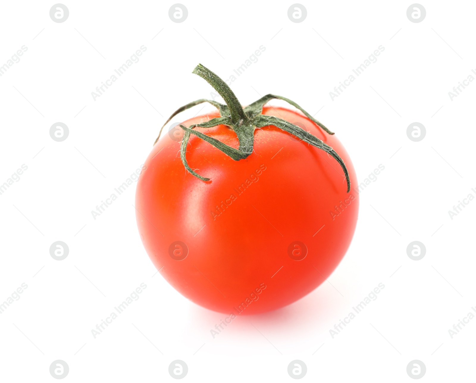 One ripe cherry tomato isolated on white Photo of One ripe cherry tomato isolated on white