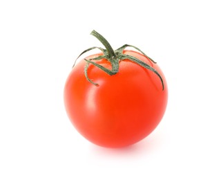 Photo of One ripe cherry tomato isolated on white