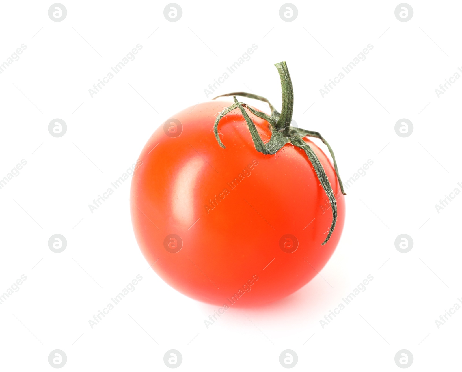 One ripe cherry tomato isolated on white Photo of One ripe cherry tomato isolated on white