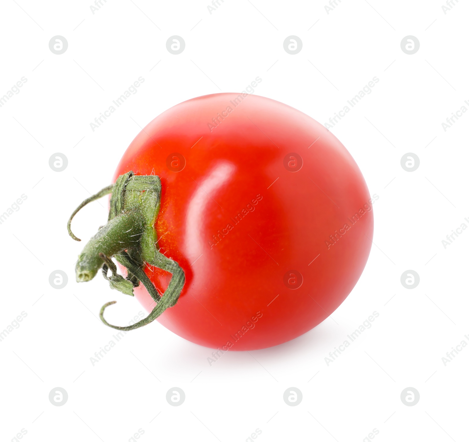 One ripe cherry tomato isolated on white Photo of One ripe cherry tomato isolated on white