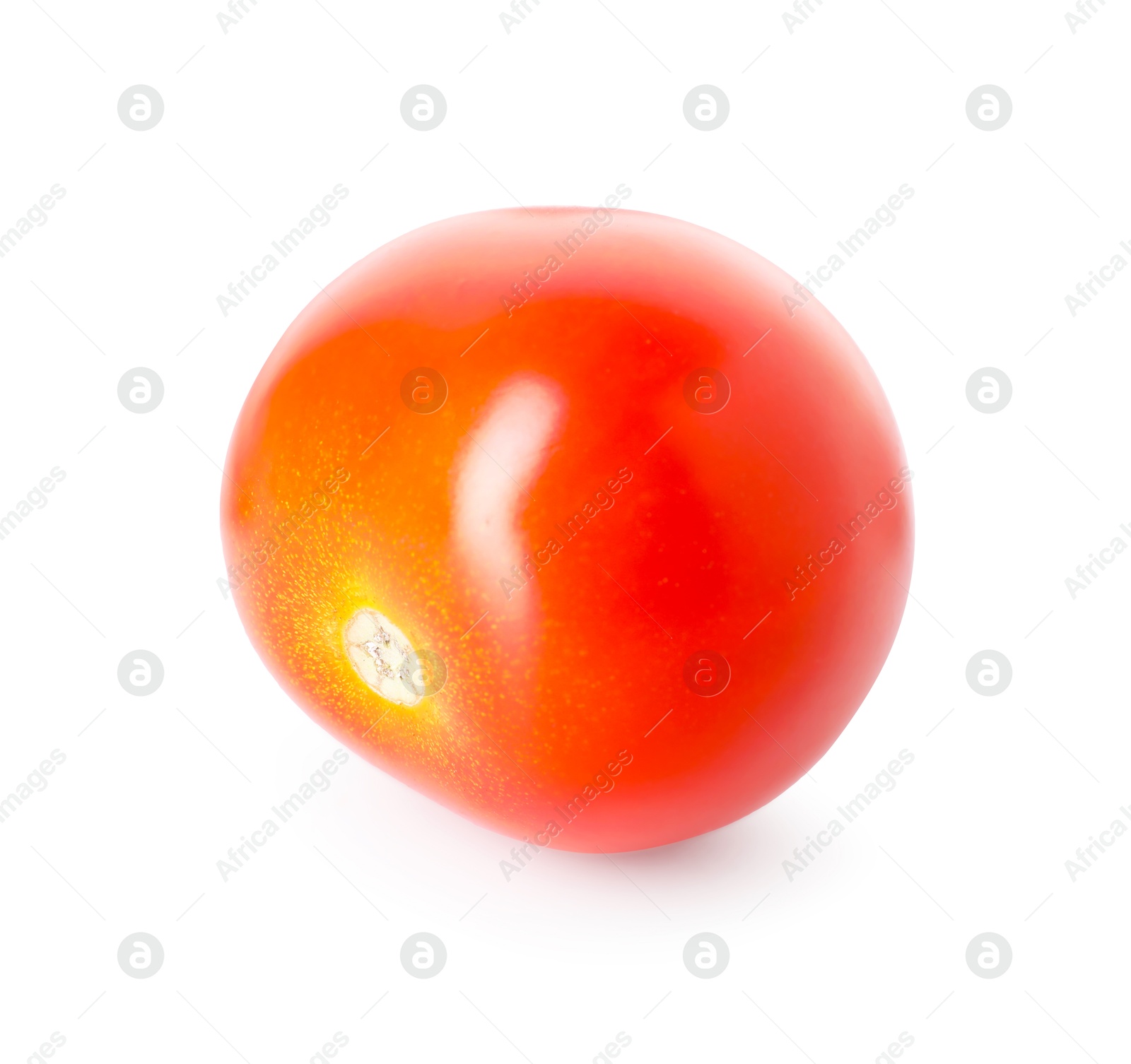 One ripe cherry tomato isolated on white Photo of One ripe cherry tomato isolated on white