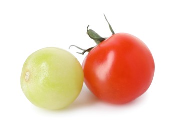 Photo of Ripe and unripe cherry tomatoes isolated on white