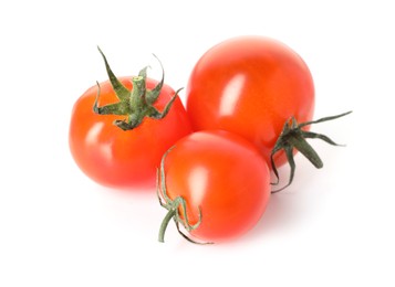 Photo of Many ripe cherry tomatoes isolated on white