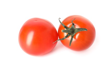 Photo of Two ripe cherry tomatoes isolated on white