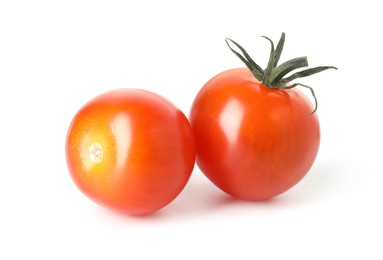 Photo of Two ripe cherry tomatoes isolated on white