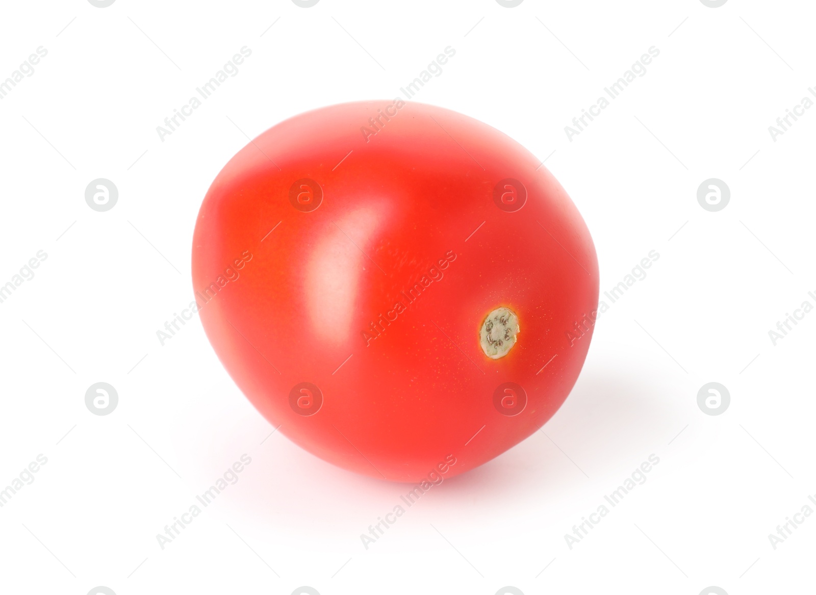 Photo of One ripe red tomato isolated on white
