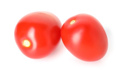 Photo of Two ripe red tomatoes isolated on white