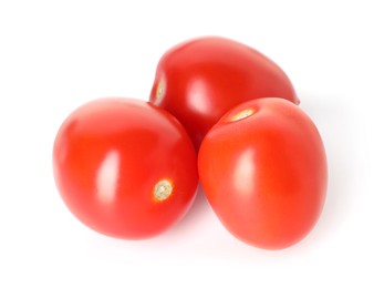 Photo of Many ripe red tomatoes isolated on white