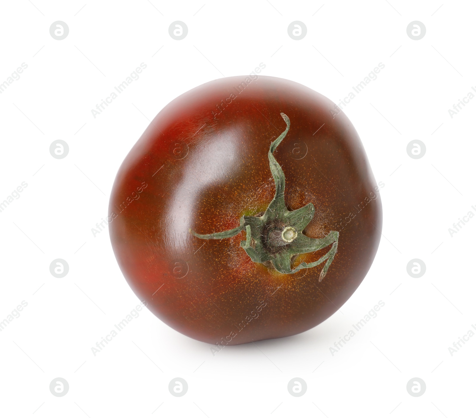 Photo of One ripe brown tomato isolated on white