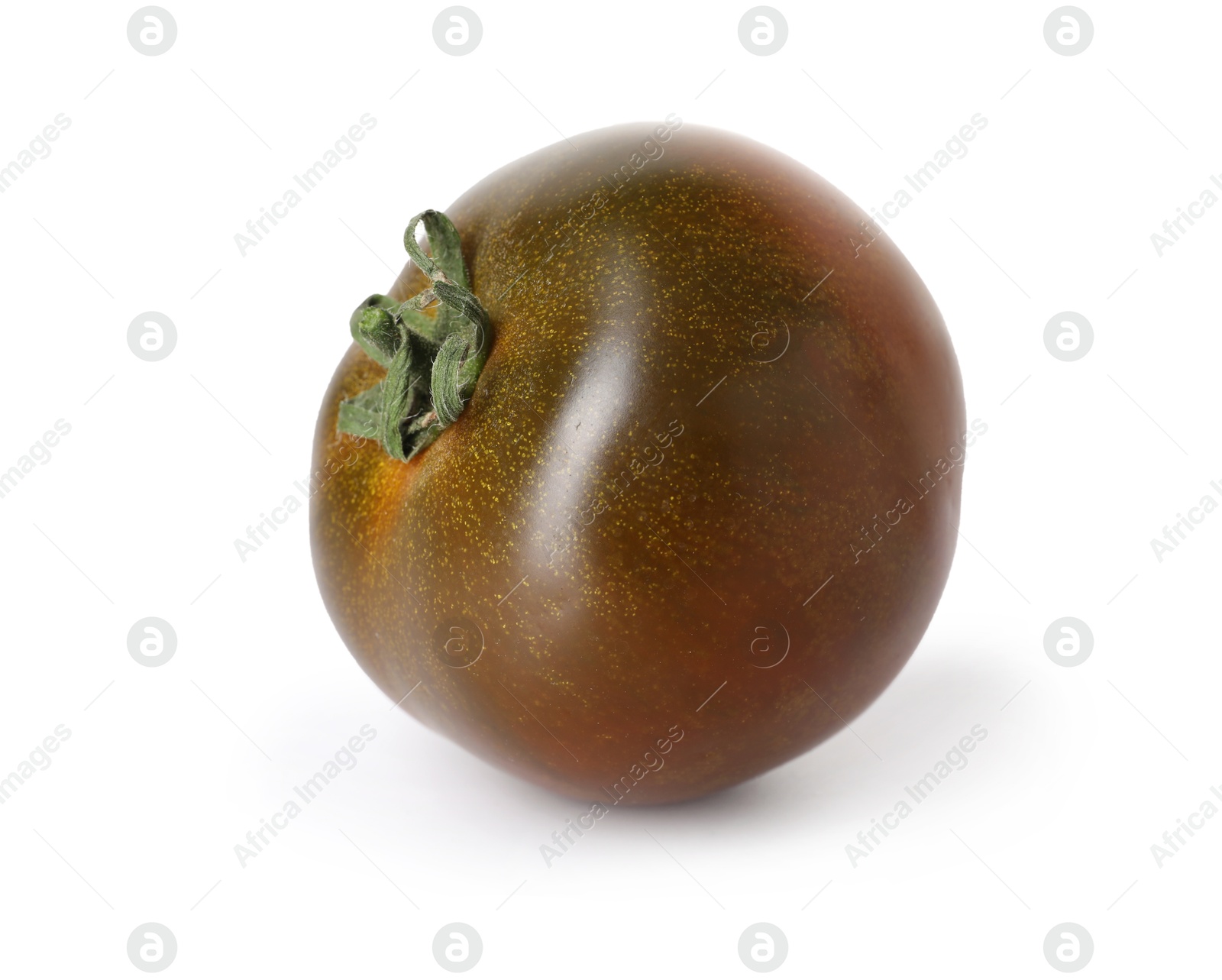 One ripe brown tomato isolated on white Photo of One ripe brown tomato isolated on white