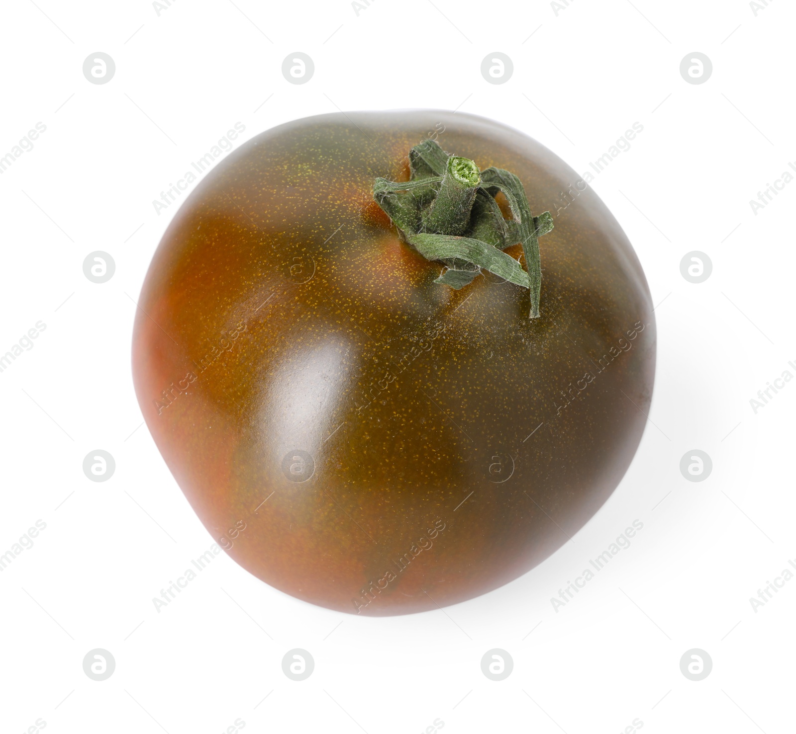 One ripe brown tomato isolated on white Photo of One ripe brown tomato isolated on white