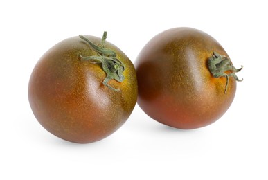 Photo of Two ripe brown tomatoes isolated on white