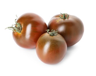 Photo of Many ripe brown tomatoes isolated on white