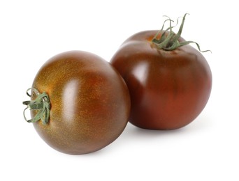Photo of Two ripe brown tomatoes isolated on white