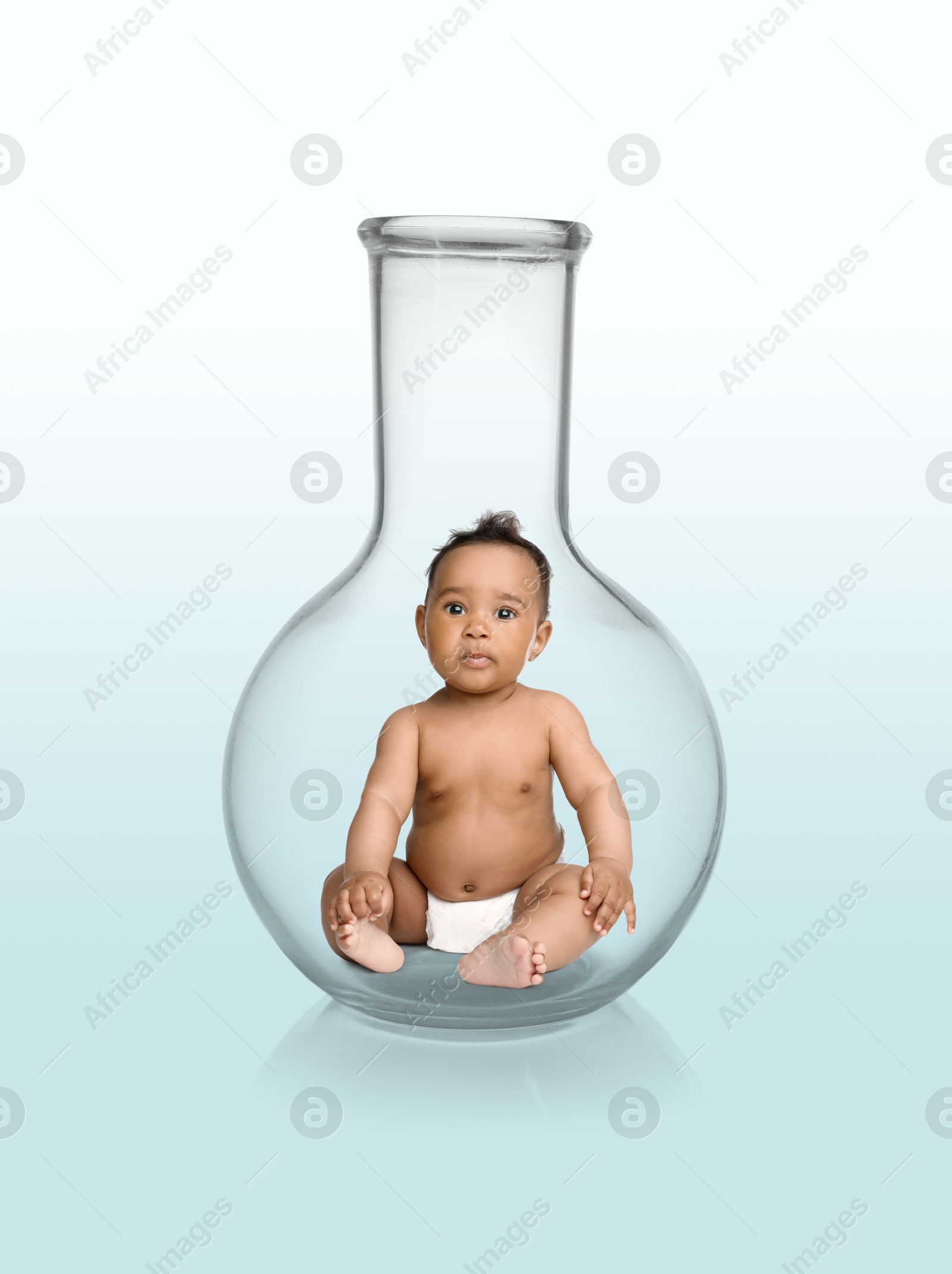In vitro fertilization (IVF). Cute little baby inside glass flask on gradient background. Artificial insemination concept Image of In vitro fertilization (IVF). Cute little baby inside glass flask on gradient background. Artificial insemination concept