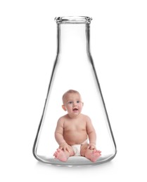 Image of In vitro fertilization (IVF). Cute little baby inside glass flask on white background. Artificial insemination concept
