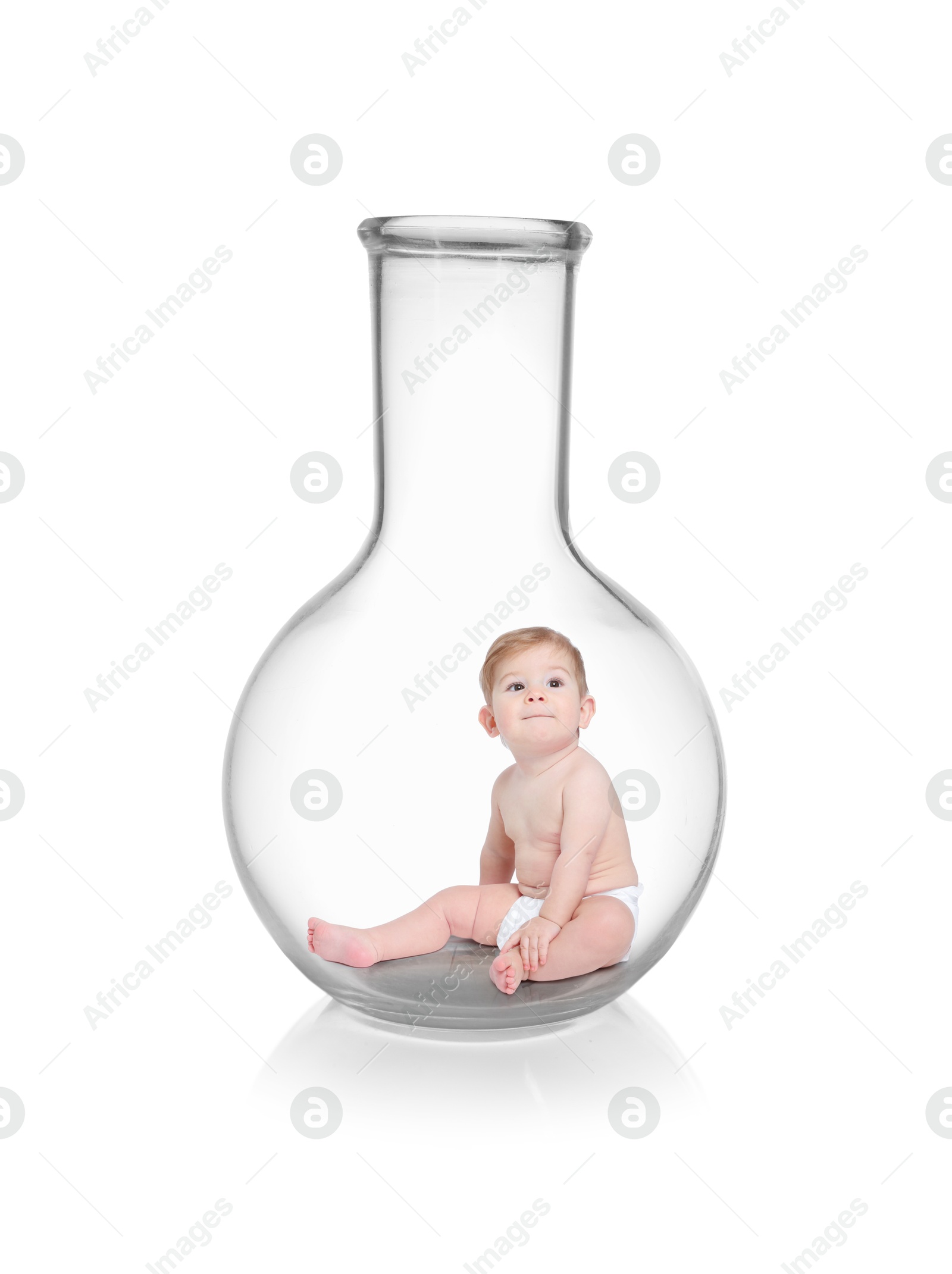 In vitro fertilization (IVF). Cute little baby inside glass flask on white background. Artificial insemination concept Image of In vitro fertilization (IVF). Cute little baby inside glass flask on white background. Artificial insemination concept