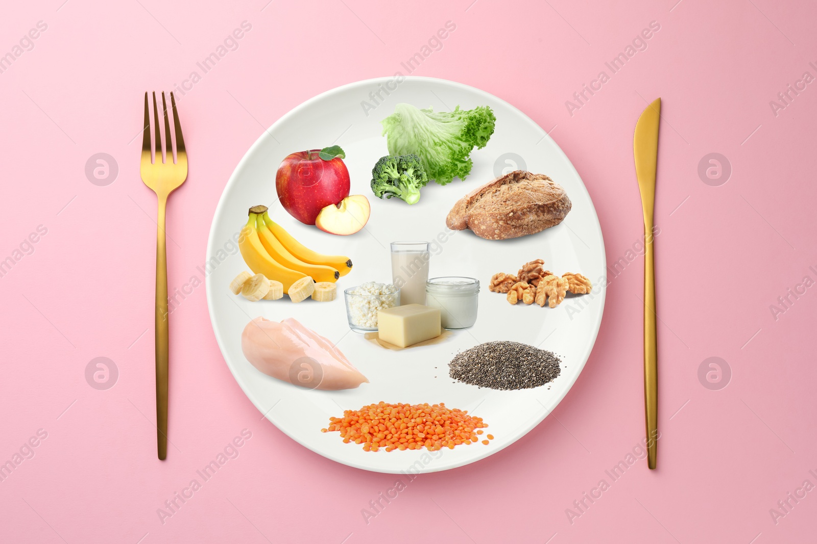 Plate with collection of different foods and cutlery on pink background, top view. Healthy eating Image of Plate with collection of different foods and cutlery on pink background, top view. Healthy eating