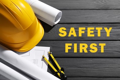 Image of Safety first, poster. Hard hat, technical drafts and compass on grey wooden background, top view