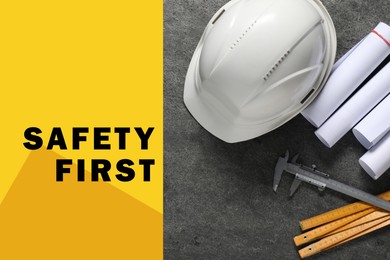 Image of Safety first, poster. Hard hat, drafts, caliper and folding ruler on grey stone background, top view