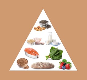Image of Healthy plate. Collection of different foods in pyramid on dark beige background, top view