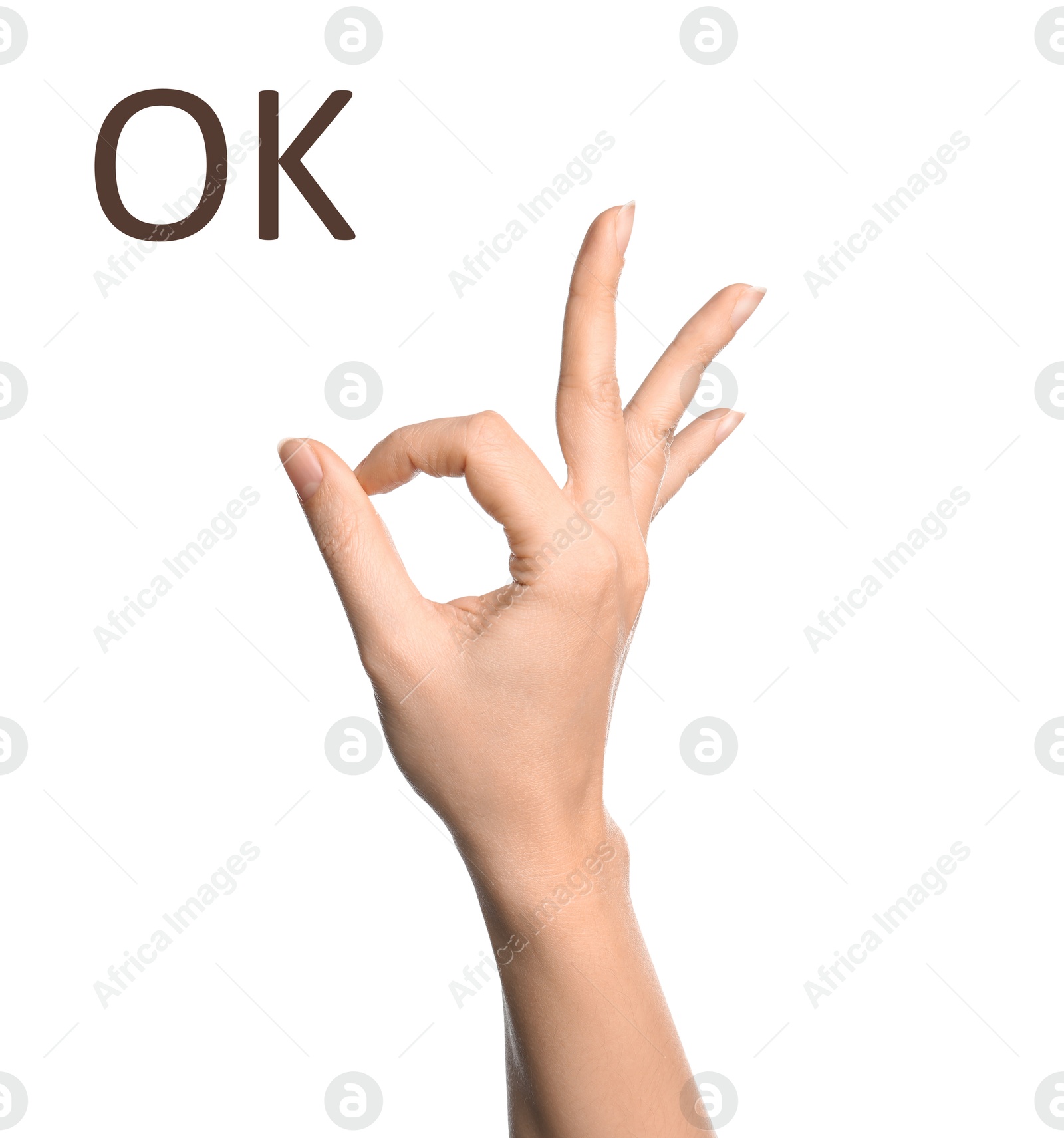 Image of Woman showing OK on white background, closeup. Sign language