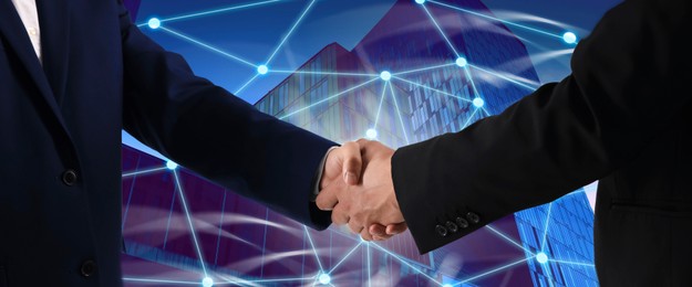 Image of Business partners shaking hands against office buildings, double exposure. Deal, agreement, partnership, success, success