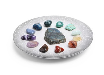 Photo of Many different healing stones isolated on white