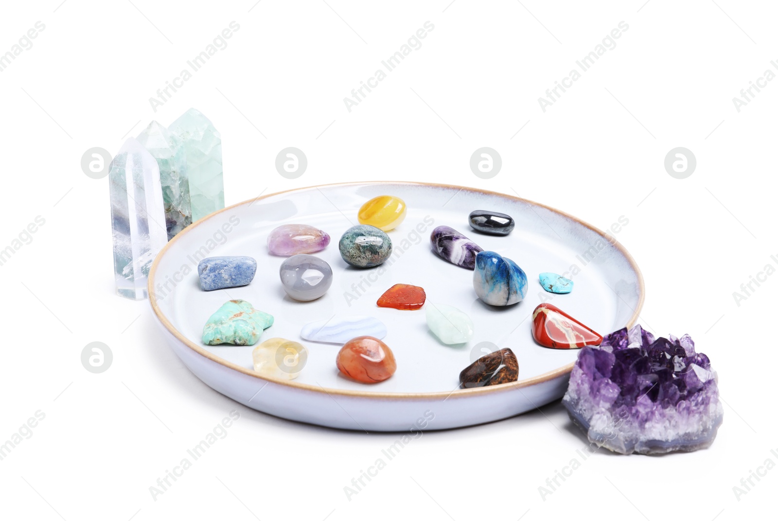 Photo of Many different healing stones isolated on white