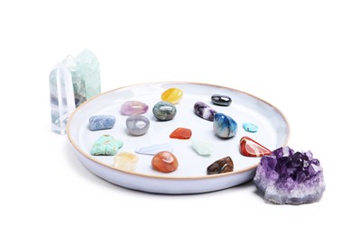 Photo of Many different healing stones isolated on white