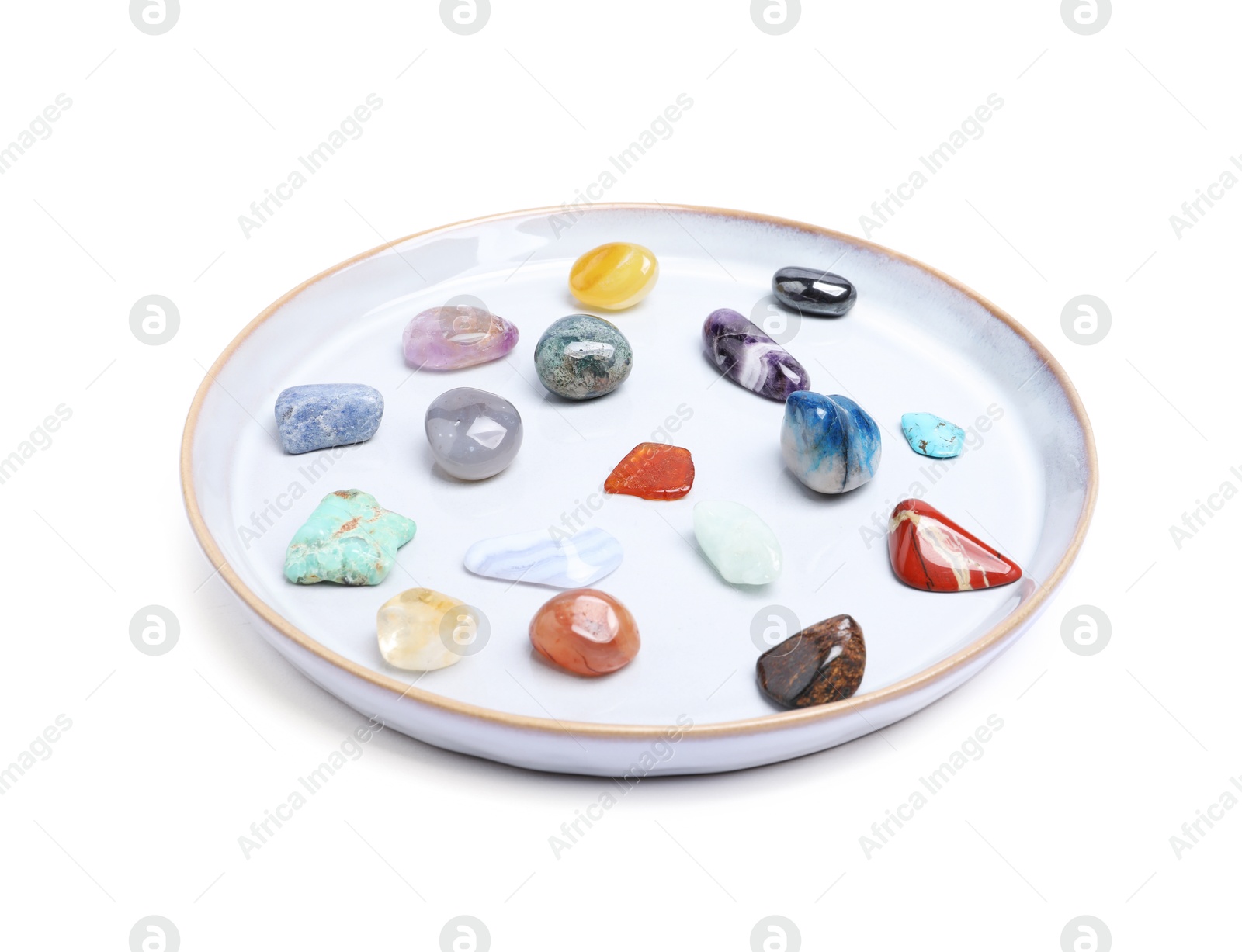 Photo of Many different healing stones isolated on white