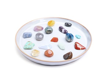 Photo of Many different healing stones isolated on white