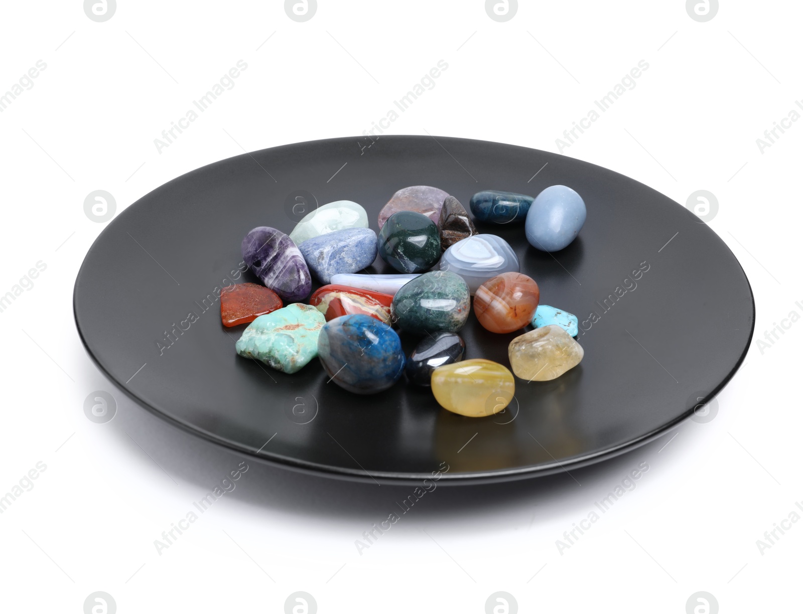 Photo of Many different healing stones isolated on white
