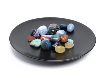 Photo of Many different healing stones isolated on white