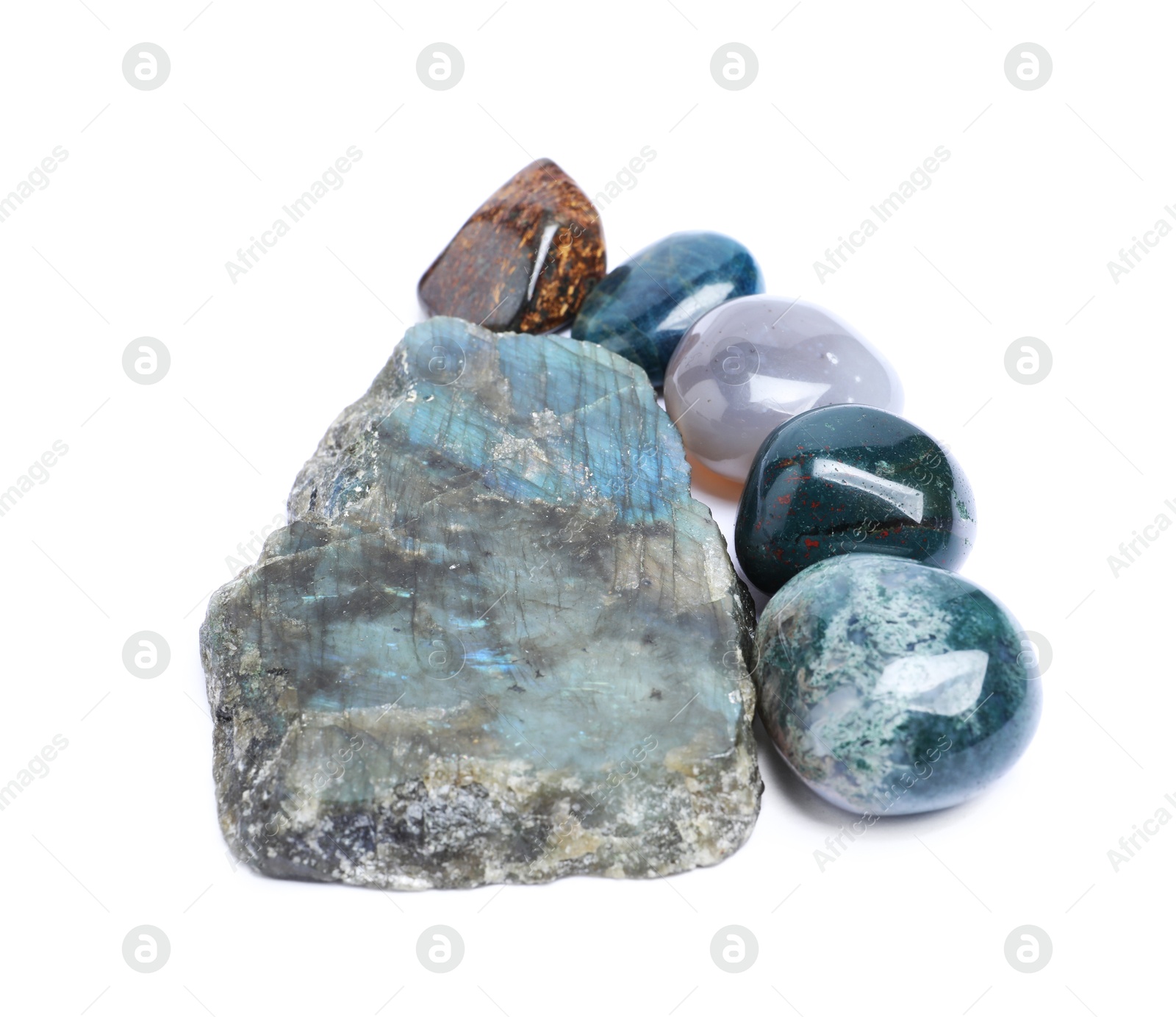 Photo of Many different healing stones isolated on white
