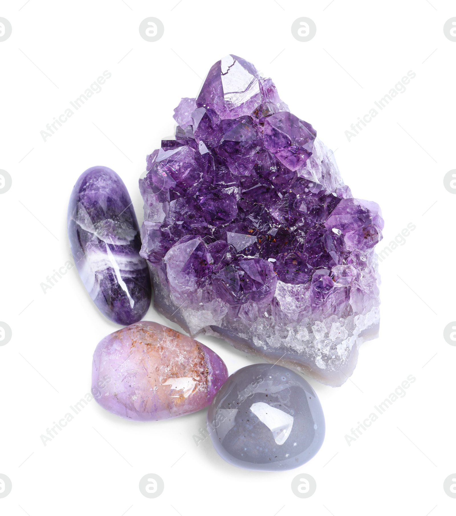 Photo of Many different healing stones isolated on white, top view