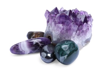 Photo of Many different healing stones isolated on white