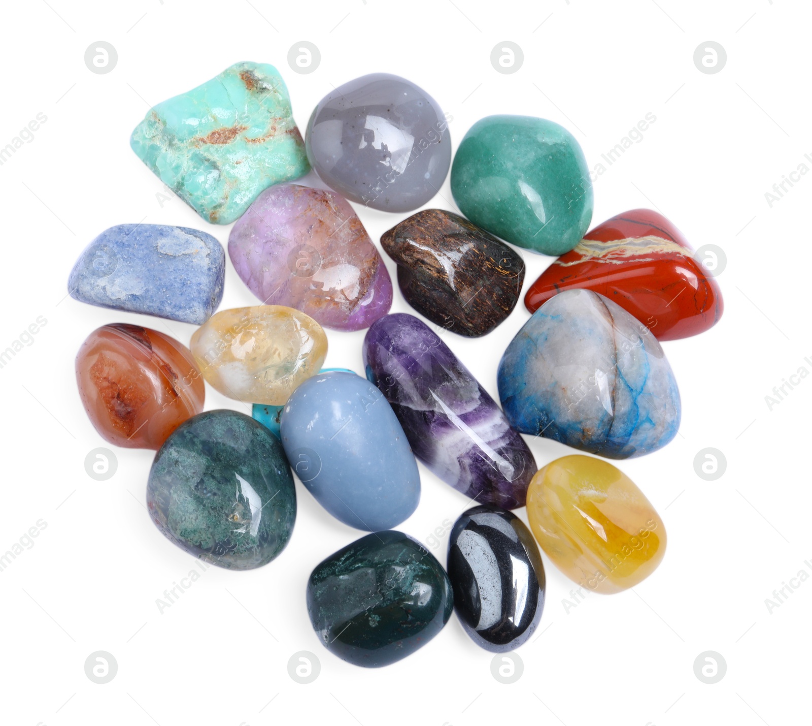 Photo of Many different healing stones isolated on white, top view