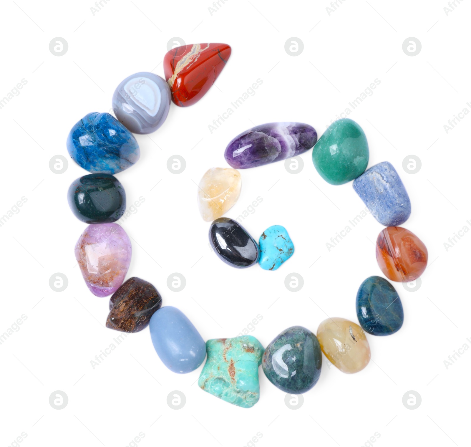 Photo of Many different healing stones isolated on white, top view
