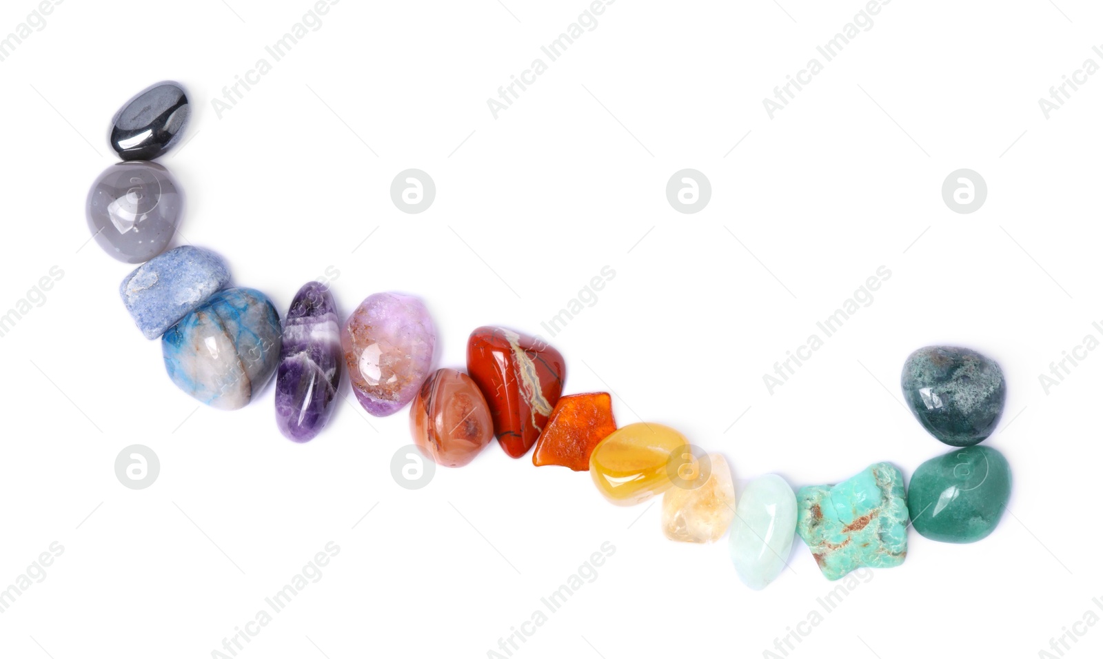 Photo of Many different healing stones isolated on white, top view