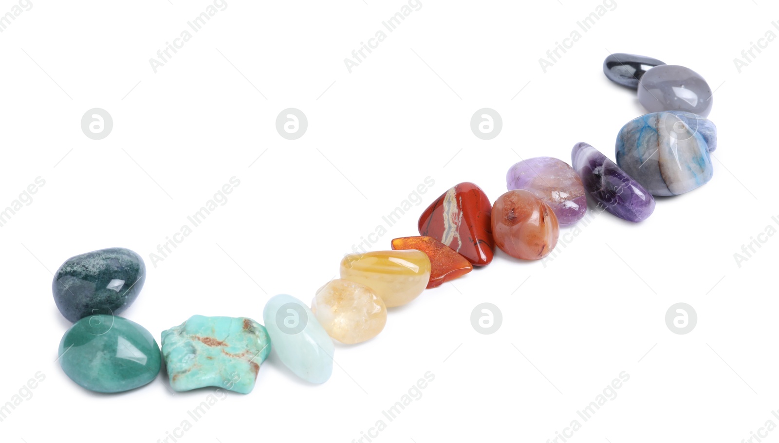 Photo of Many different healing stones isolated on white