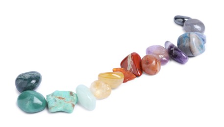 Photo of Many different healing stones isolated on white