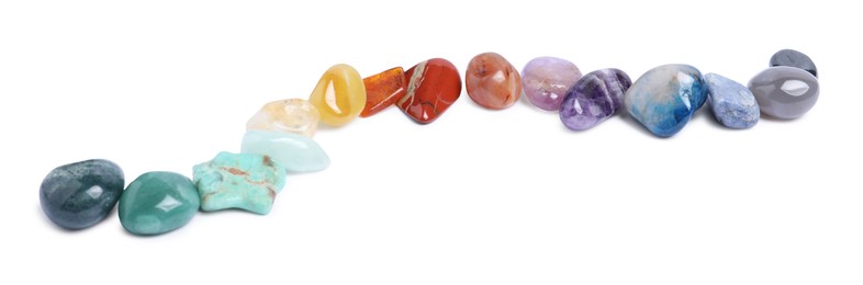 Photo of Many different healing stones isolated on white