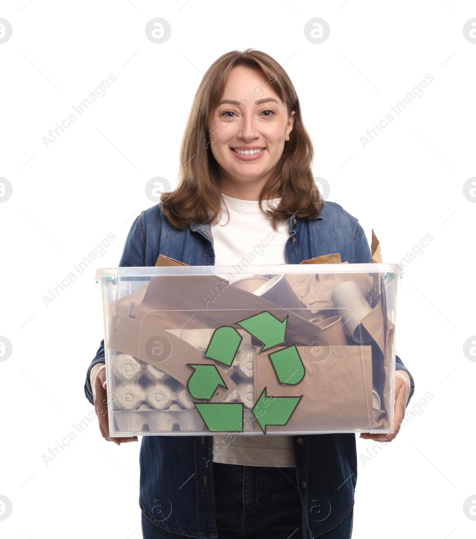 Photo of Recycling. Smiling woman holding plastic box with different waste paper on white background