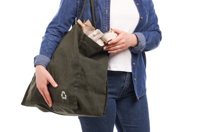Photo of Recycling. Woman with bag full of different waste paper on white background, closeup