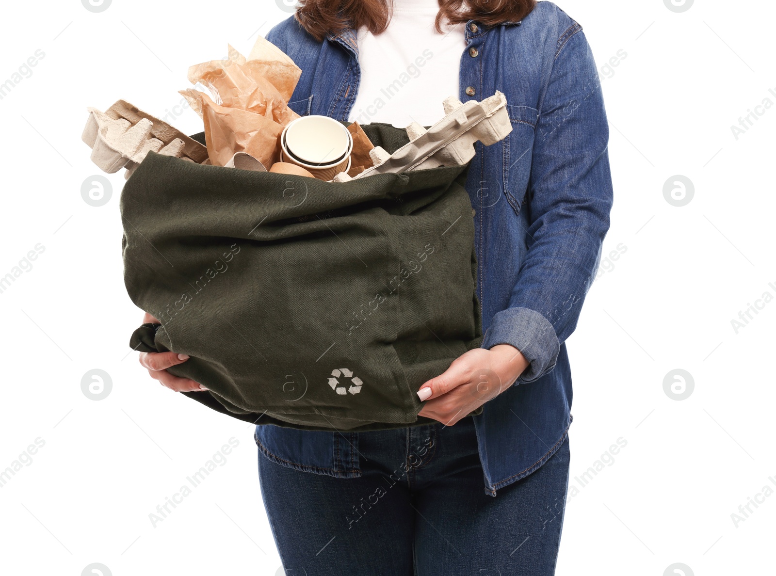 Photo of Recycling. Woman with bag full of different waste paper on white background, closeup