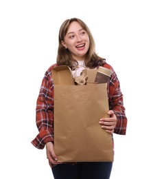 Photo of Recycling. Smiling woman with bag full of different waste paper on white background